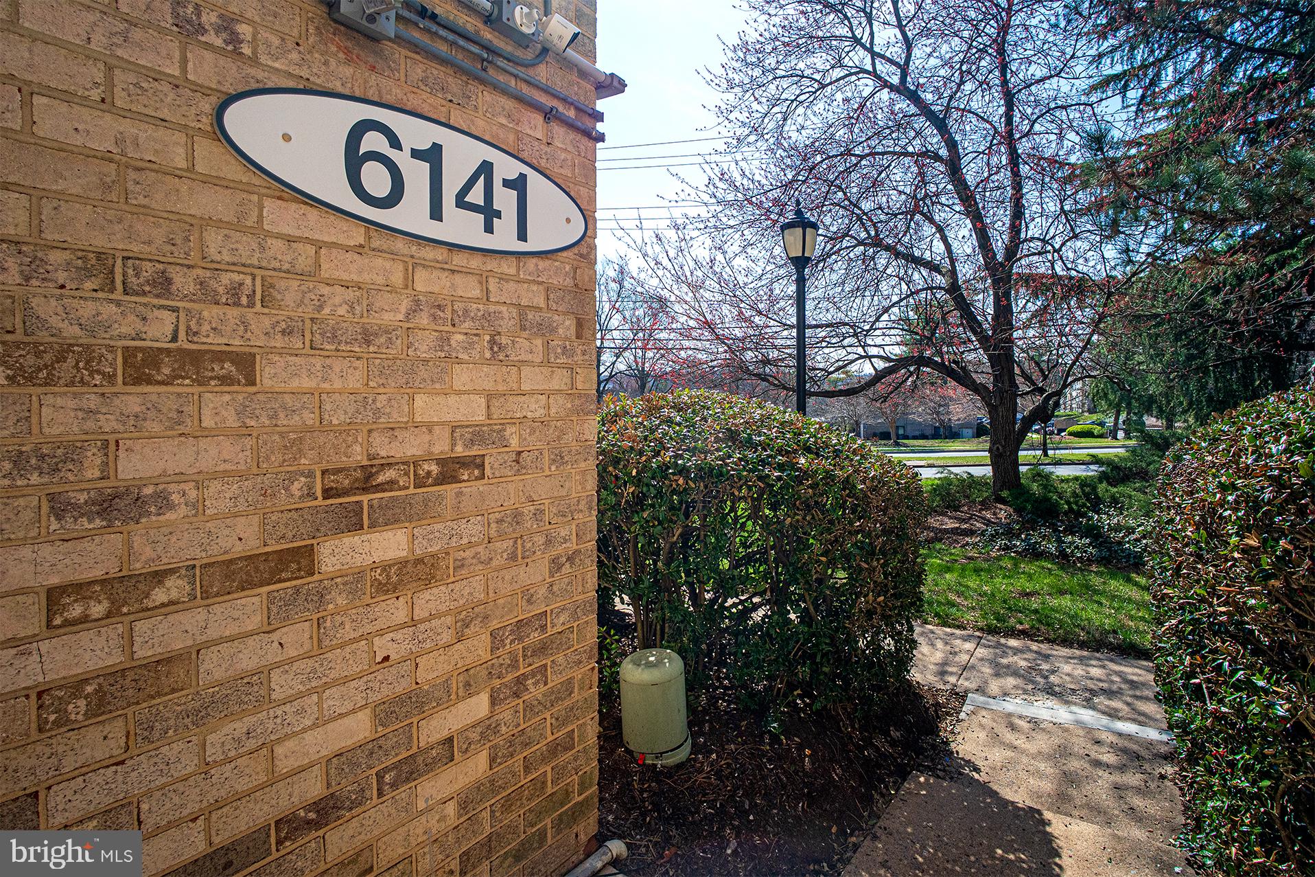 6141 Edsall Road, Unit B Alexandria, VA 22304 - Photo 19 of 27 a sign that is on the side of a building