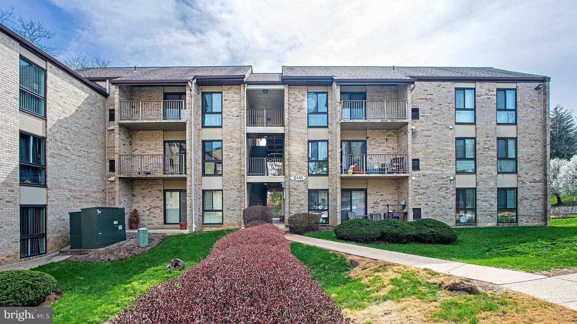 6141 Edsall Road, Unit B Alexandria, VA 22304 - Photo 21 of 27 a front view of a building with garden