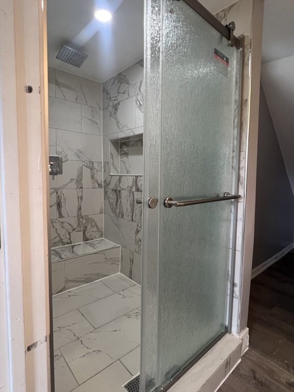 2 Oliver Street, Unit 3 Southbridge, MA 01550 - Photo 2 of 7 a bathroom with a glass shower door