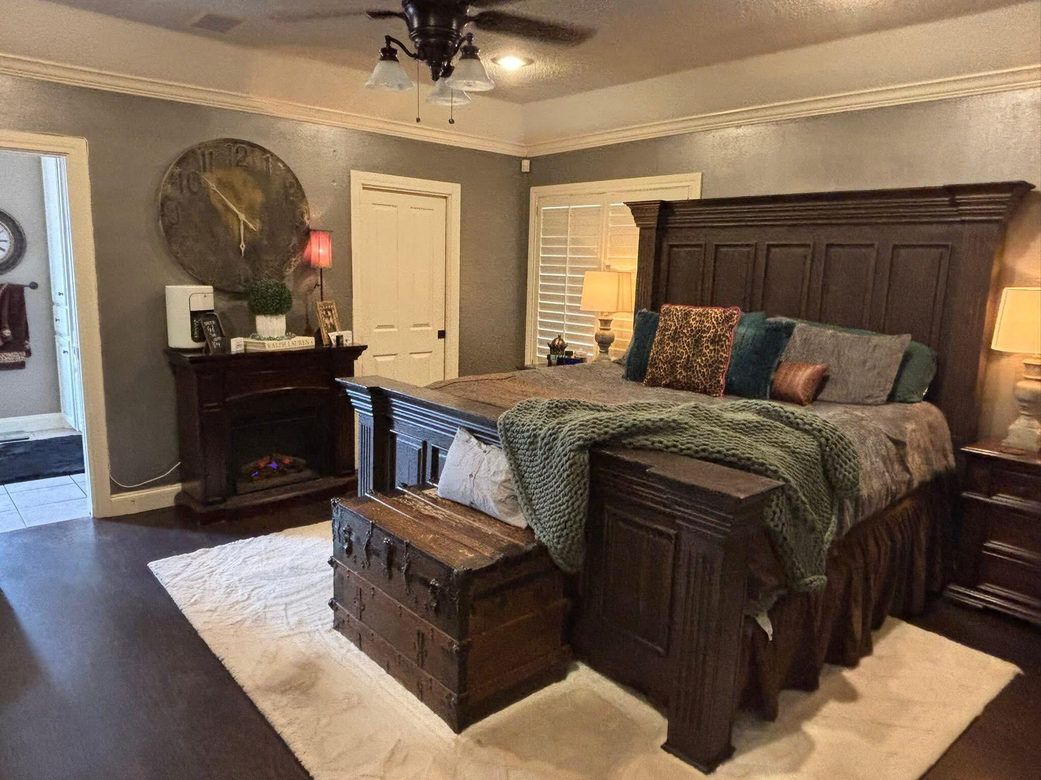 1402 9th Street Shallowater, TX 79363 - Photo 12 of 49 a bed room with a bed and a television