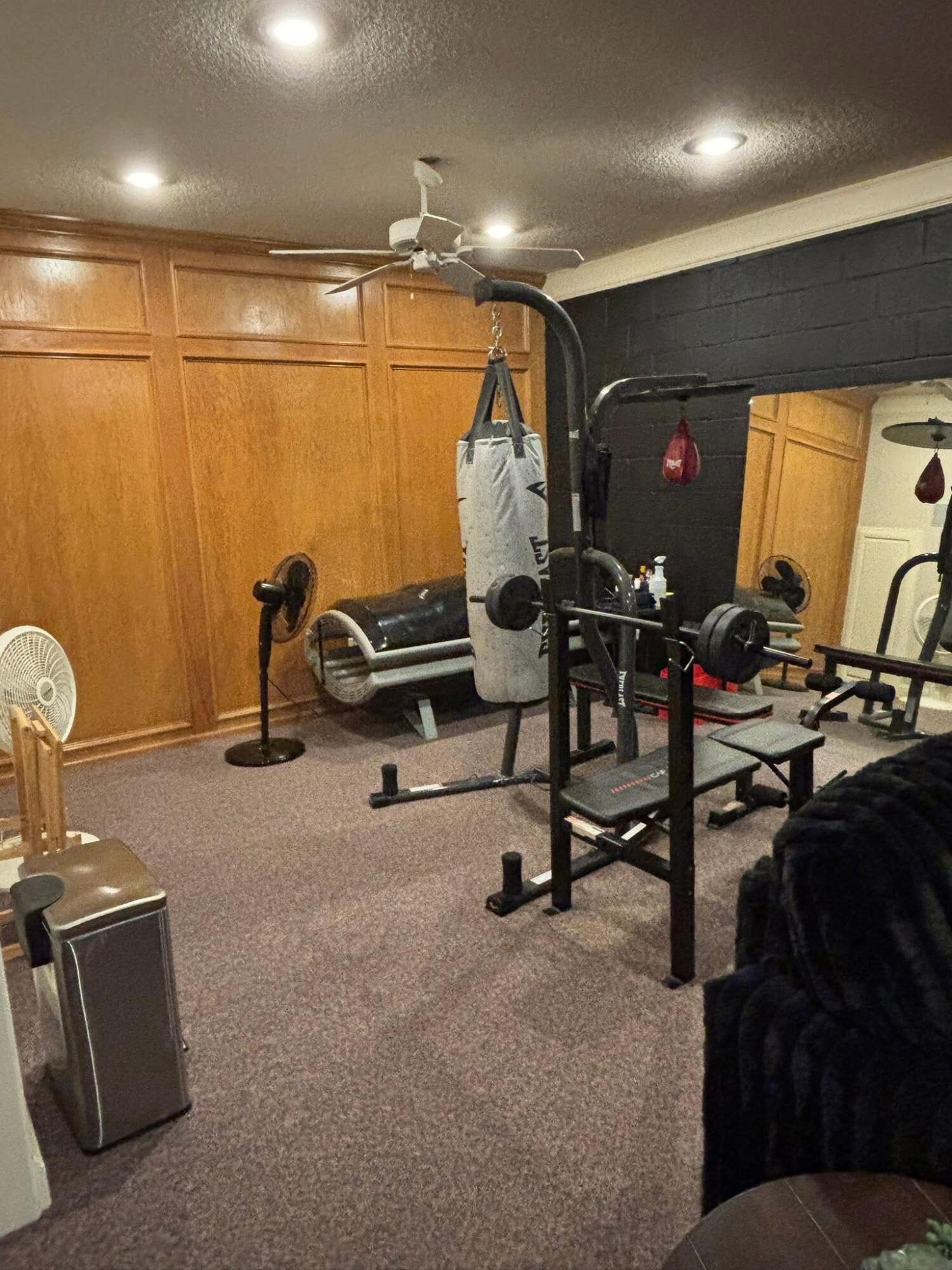 1402 9th Street Shallowater, TX 79363 - Photo 22 of 49 a view of a room with gym equipment