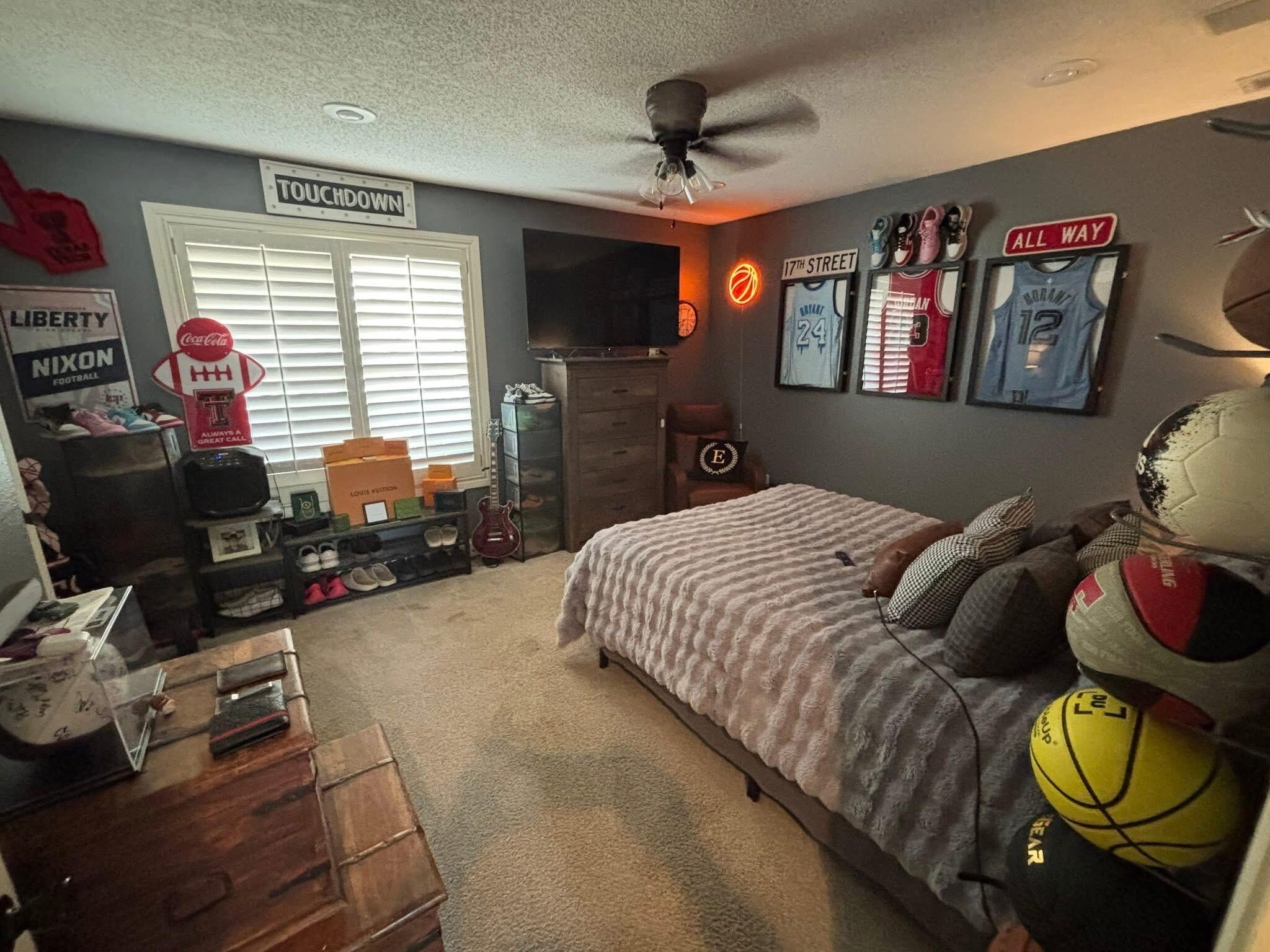 1402 9th Street Shallowater, TX 79363 - Photo 29 of 49 a bedroom with a bed dresser and window