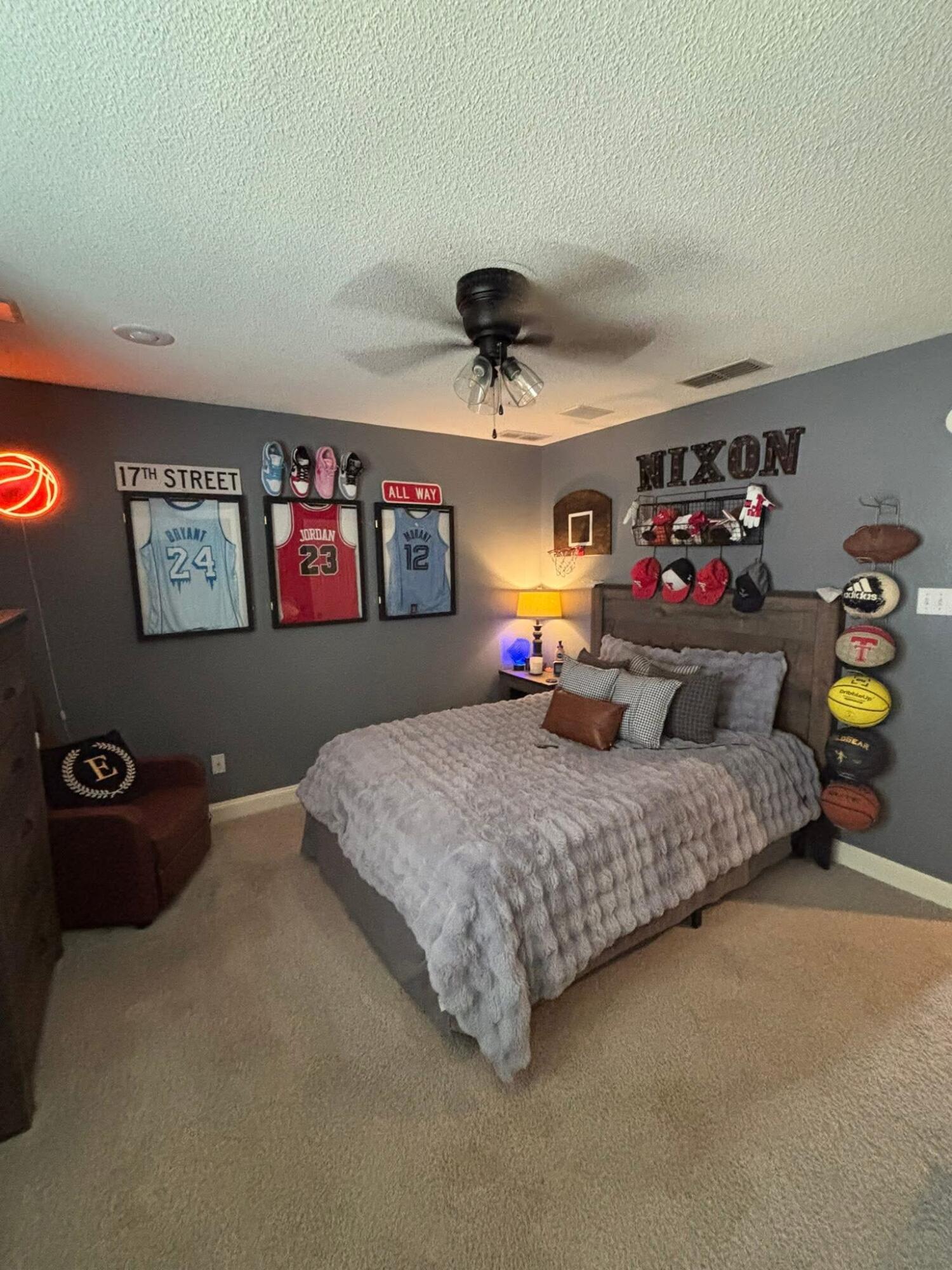 1402 9th Street Shallowater, TX 79363 - Photo 30 of 49 a bedroom with bed and window
