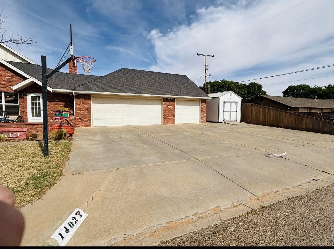 1402 9th Street Shallowater, TX 79363 - Photo 3 of 49 a view of a house with a street