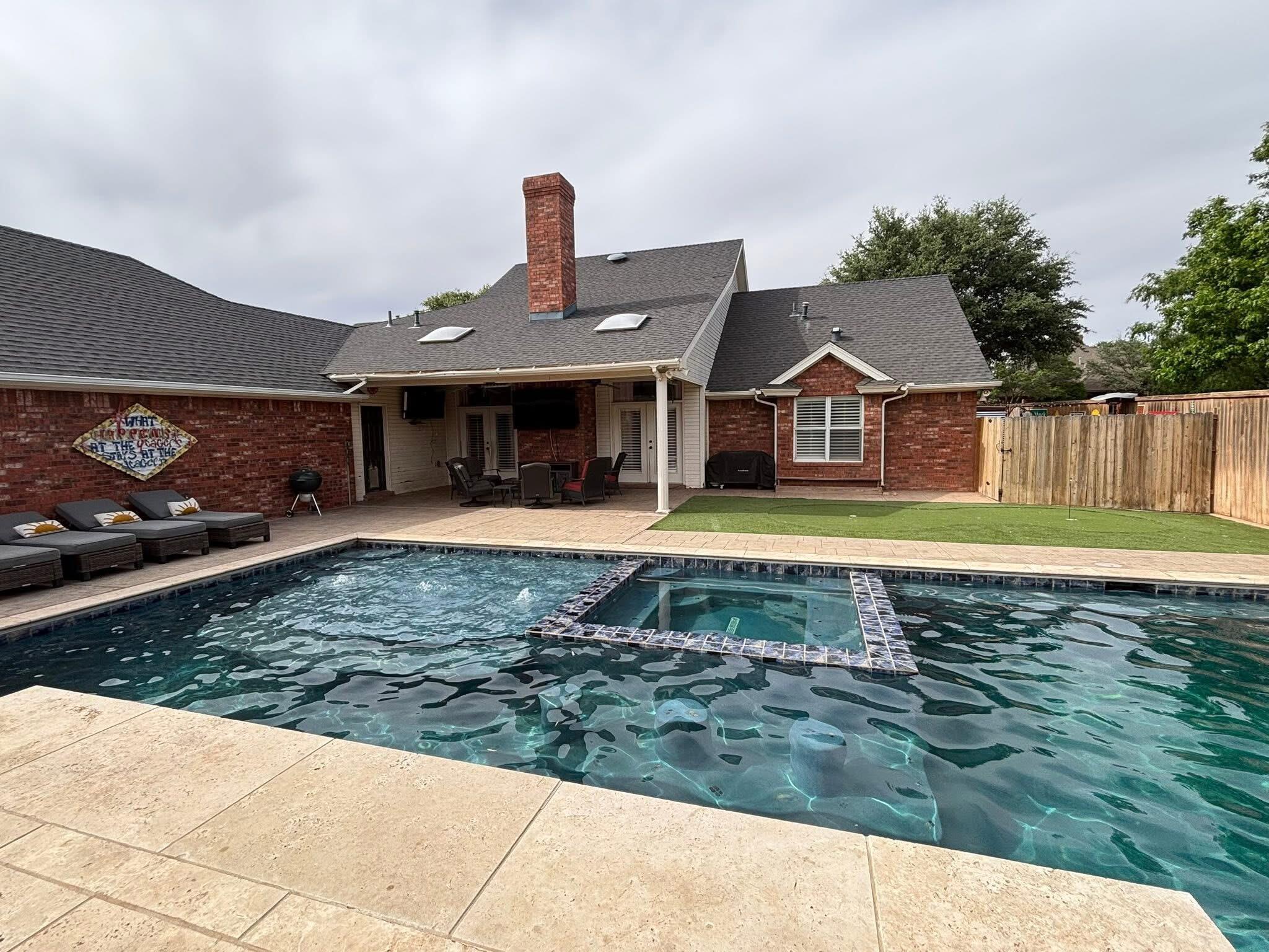 1402 9th Street Shallowater, TX 79363 - Photo 42 of 49 a front view of a house with a yard