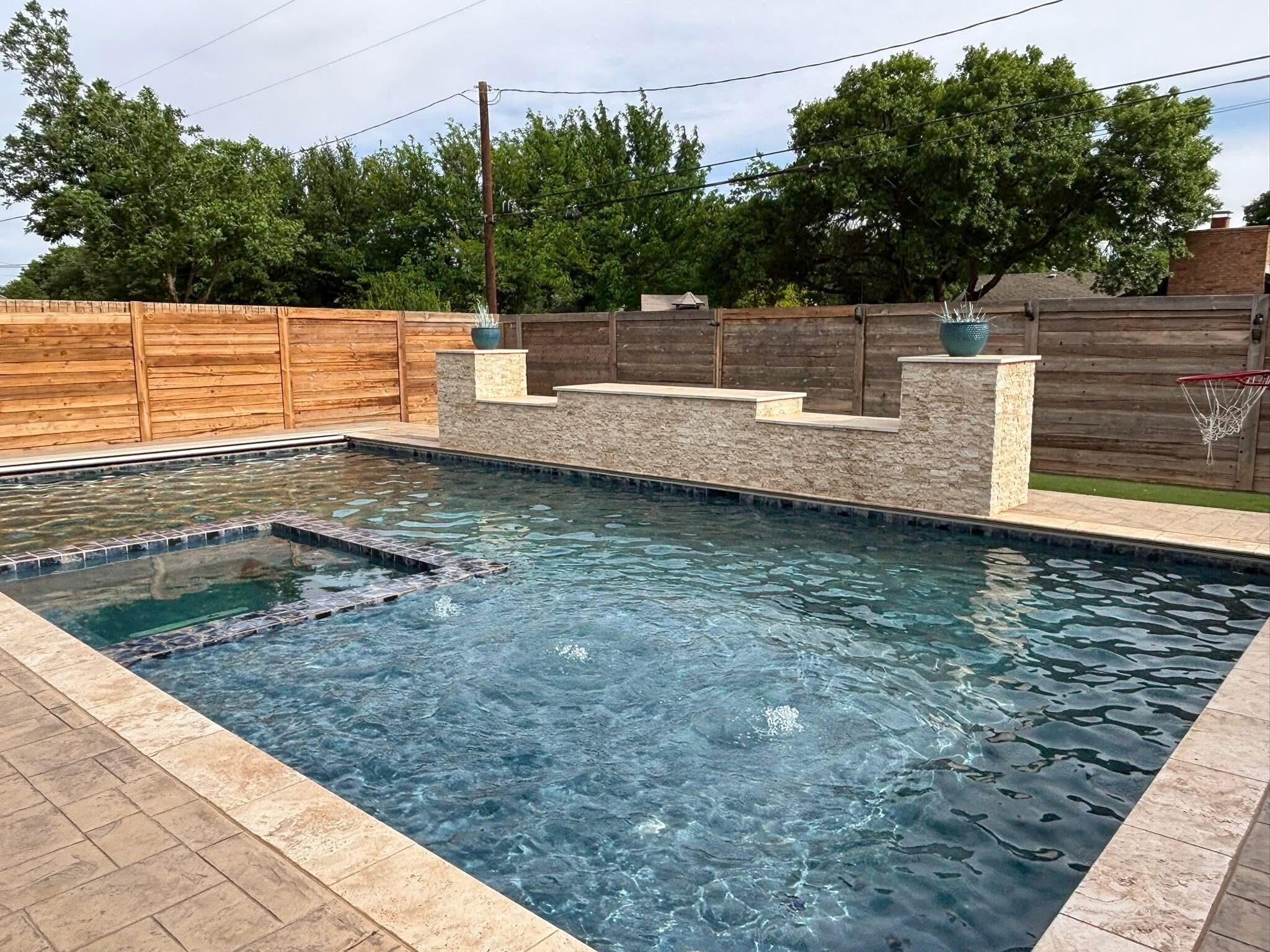 1402 9th Street Shallowater, TX 79363 - Photo 43 of 49 a view of a backyard with trees