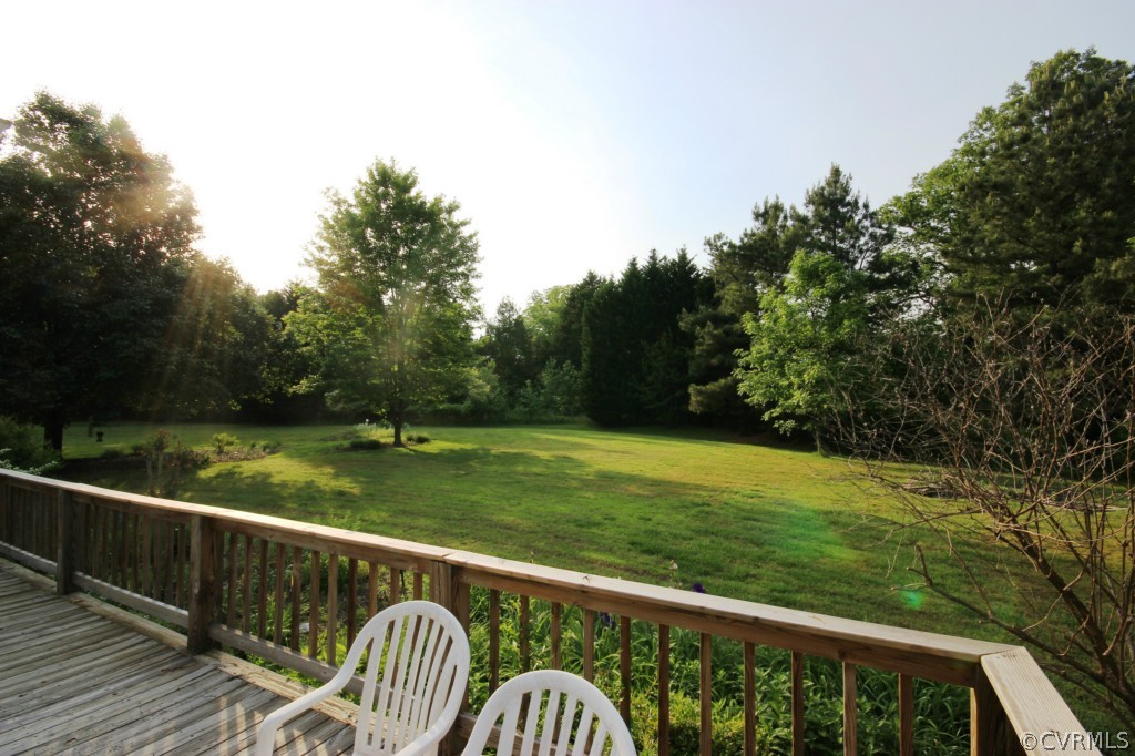 5200 Copperpenny Road Chesterfield, VA 23832 - Photo 23 of 24 a view of a wooden deck with a yard