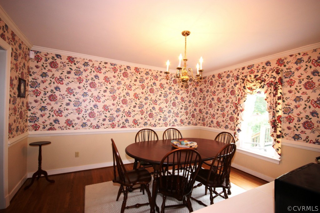 5200 Copperpenny Road Chesterfield, VA 23832 - Photo 10 of 24 a view of a dining room with furniture and chandelier