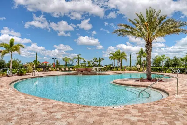 a front view of house with yard and entertaining space