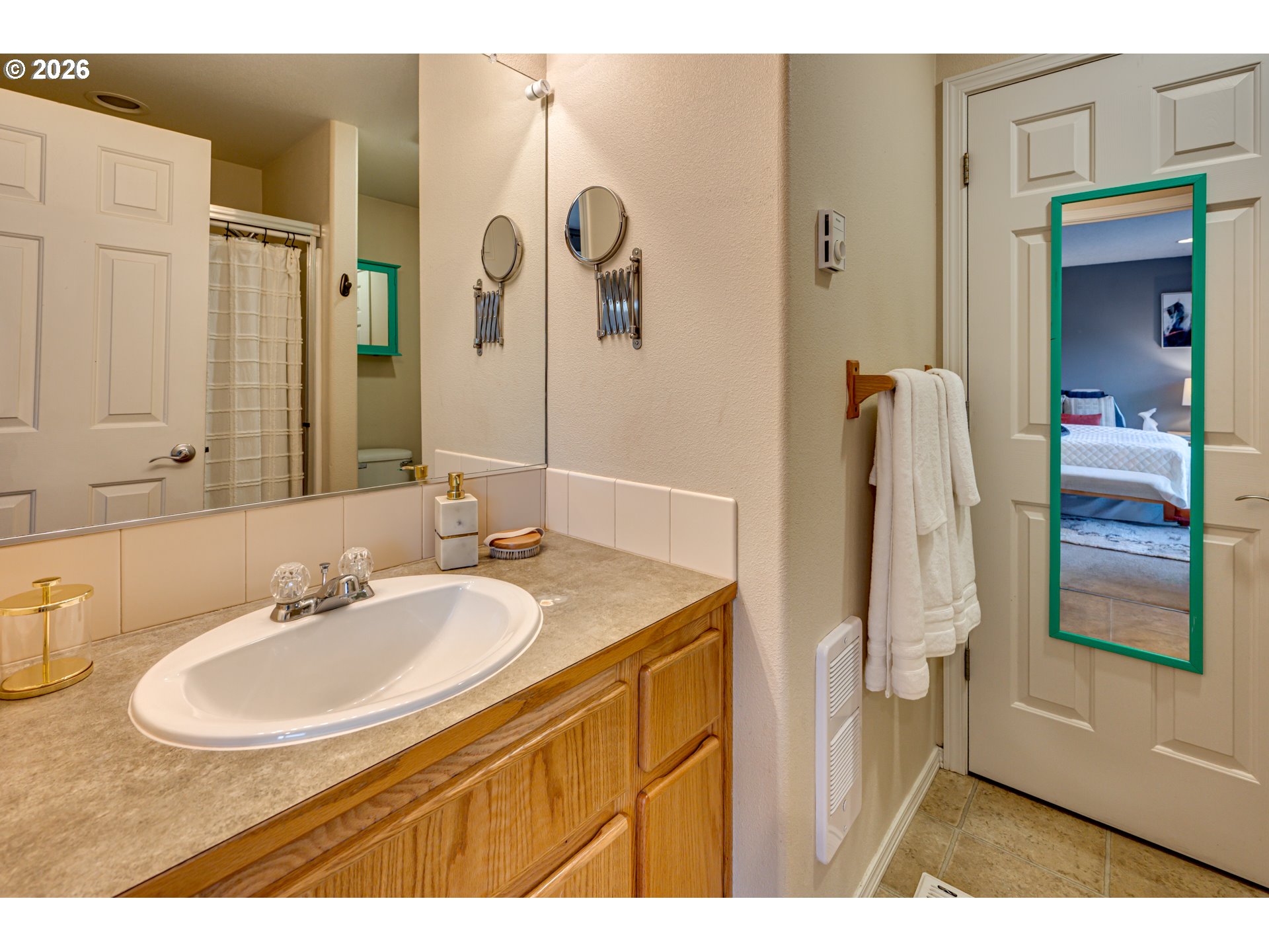 220 Mable Lane Woodland, WA 98674 - Photo 15 of 31 a bathroom with a sink and a mirror