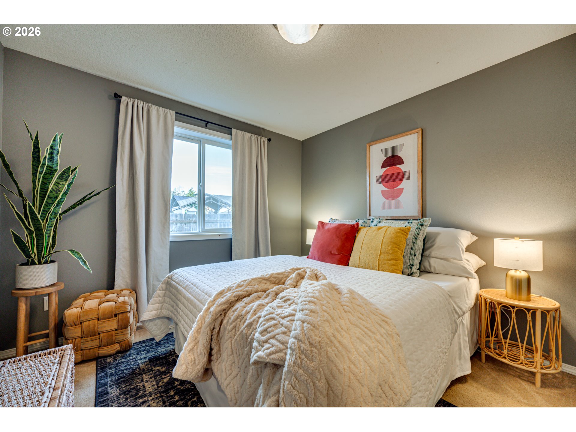 220 Mable Lane Woodland, WA 98674 - Photo 16 of 31 a bedroom with a bed and a potted plant