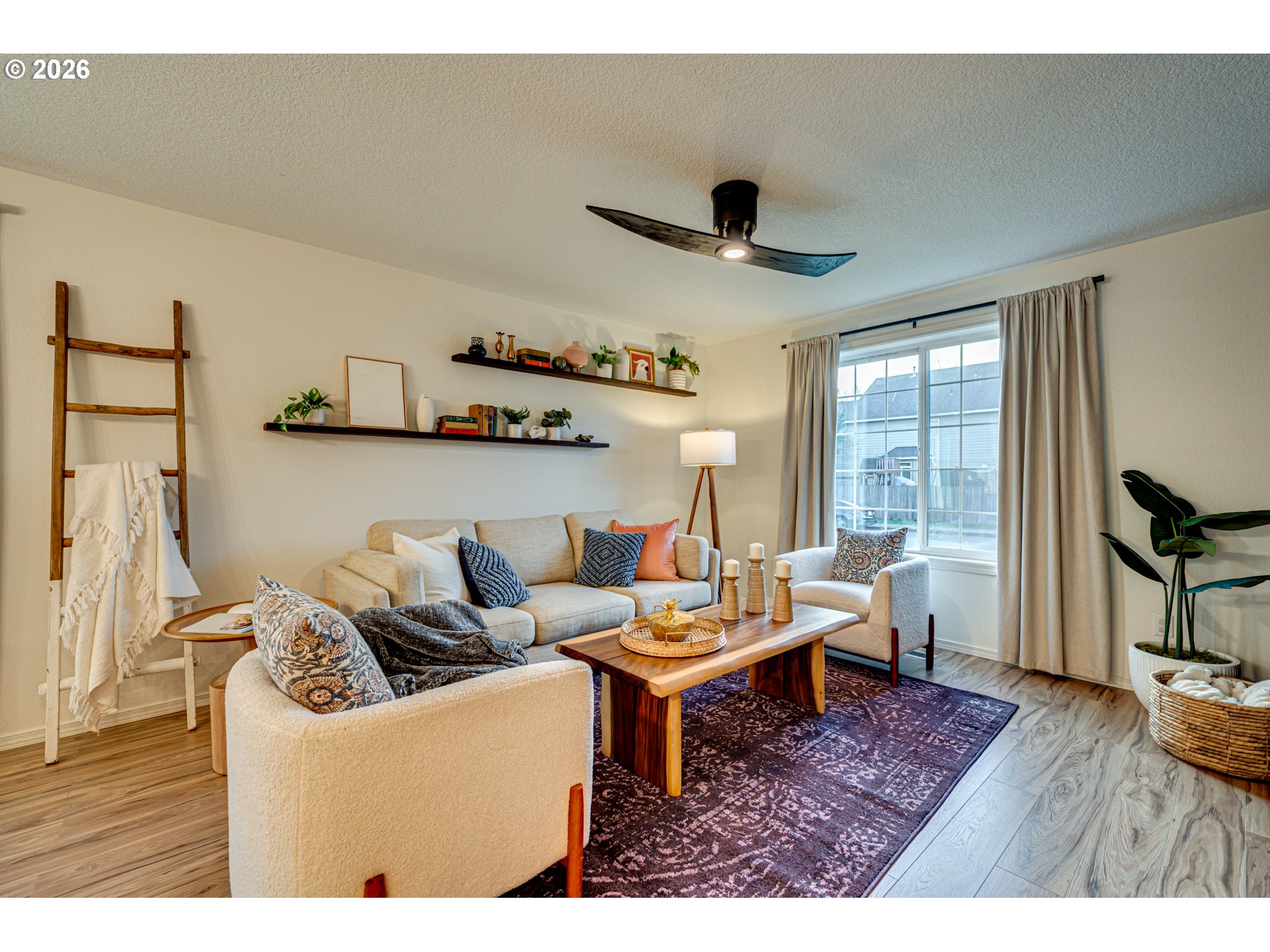 220 Mable Lane Woodland, WA 98674 - Photo 7 of 31 a living room with furniture and a wooden floor