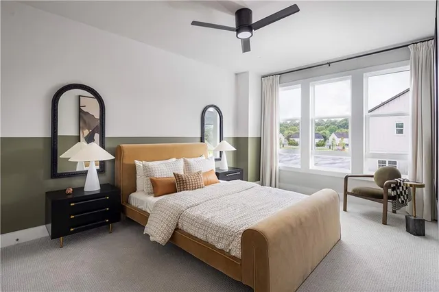 a bedroom with bed and a window