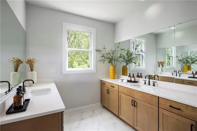 a kitchen with a sink and a window