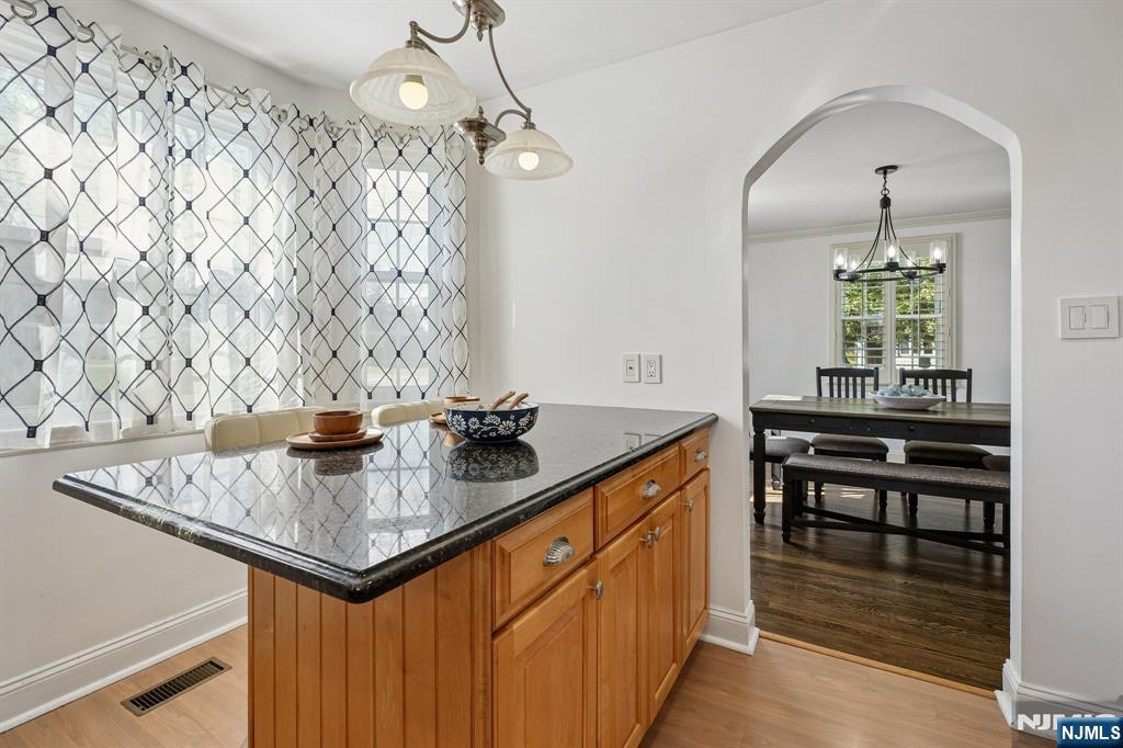 122 Johnson Avenue Mahwah, NJ 07430 - Photo 11 of 40 a kitchen with sink cabinets and window