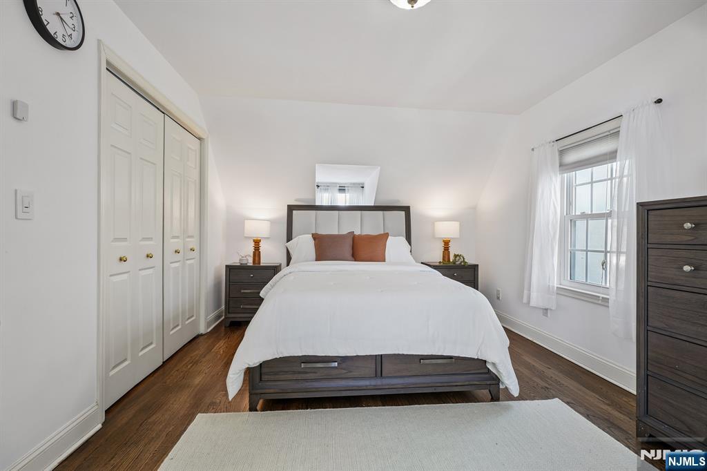 122 Johnson Avenue Mahwah, NJ 07430 - Photo 13 of 40 a room with a bed and wooden floor