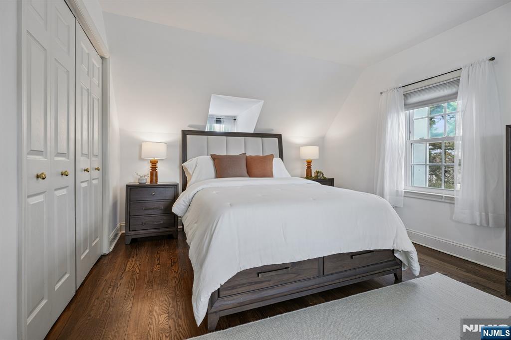 122 Johnson Avenue Mahwah, NJ 07430 - Photo 14 of 40 a bedroom with a bed and a window