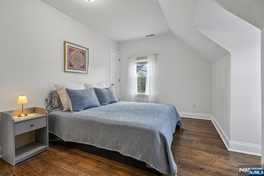 122 Johnson Avenue Mahwah, NJ 07430 - Photo 16 of 40 a bedroom with a bed and a window
