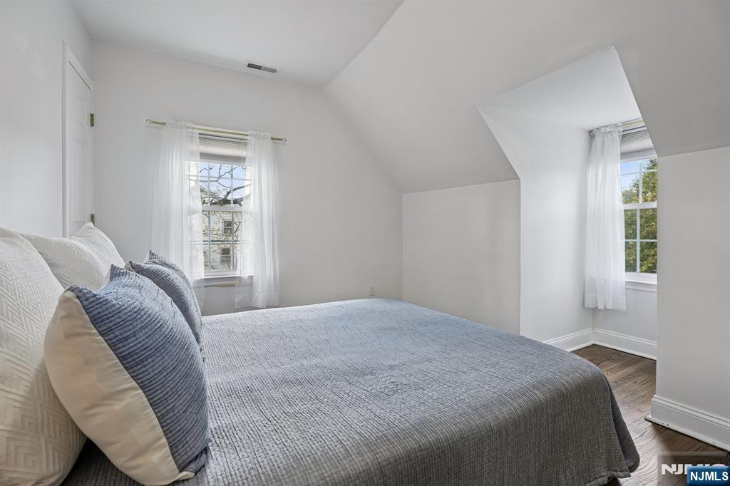 122 Johnson Avenue Mahwah, NJ 07430 - Photo 17 of 40 a bedroom with a bed and a window
