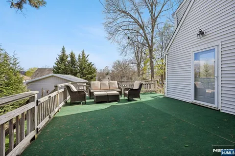 a roof of house with outdoor seating