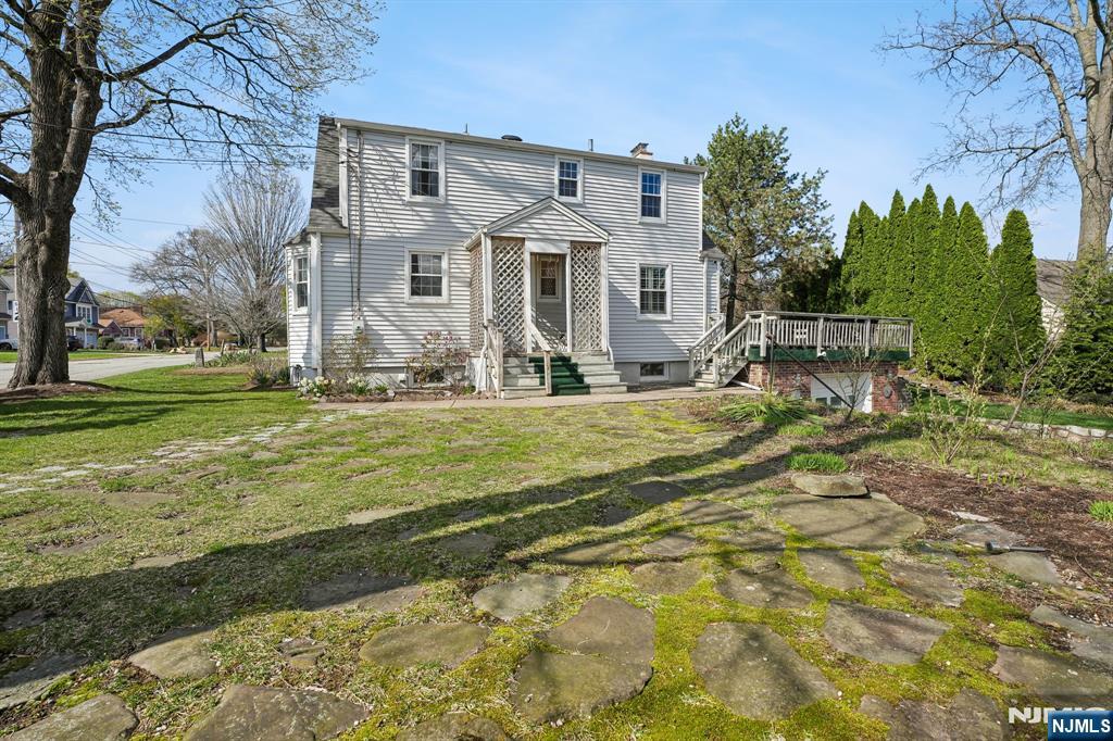122 Johnson Avenue Mahwah, NJ 07430 - Photo 28 of 40 a view of a house with backyard and sitting area