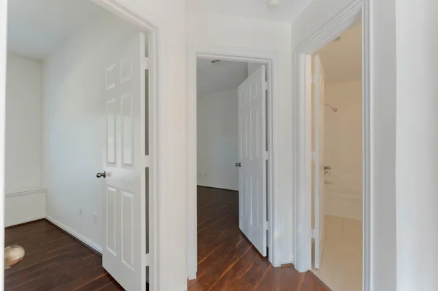 a bathroom with a shower and a sink