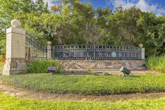 a swimming pool with outdoor seating and yard