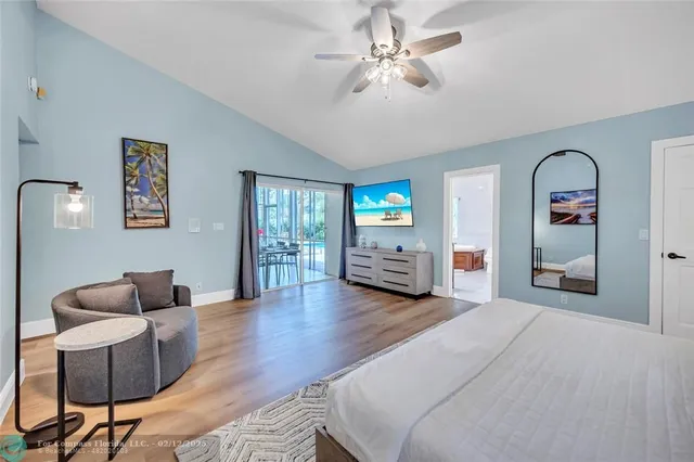a spacious bathroom with a double vanity sink and a mirror