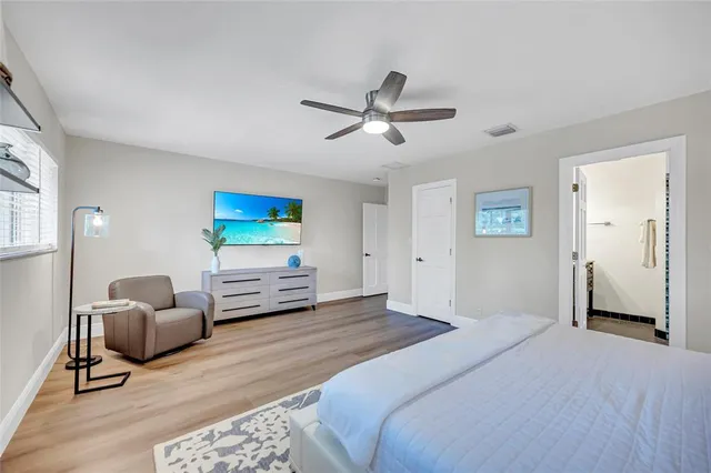 a bathroom with a sink a vanity and a mirror