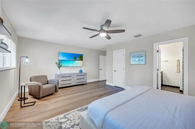 a bathroom with a sink a vanity and a mirror