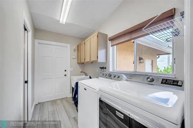 a view of backyard with swimming pool