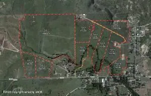 a view of a city with an ocean