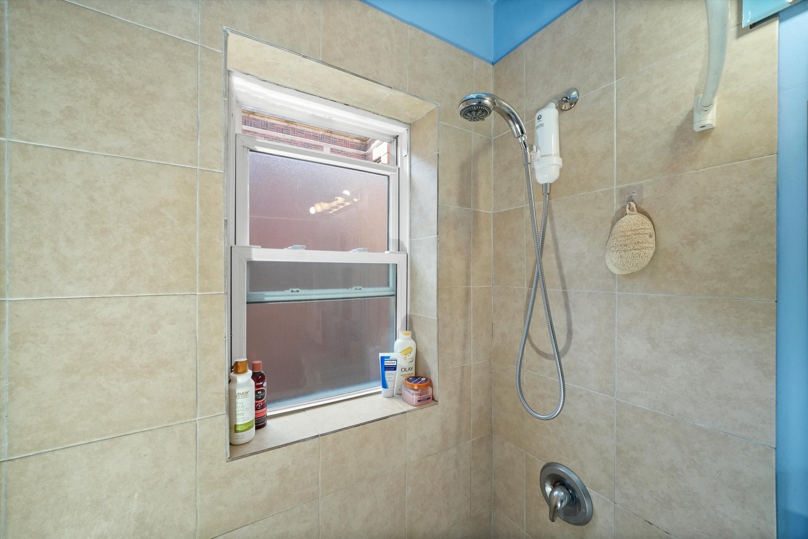 52 Forest Avenue, Unit 2S Riverside, IL 60546 - Photo 14 of 43 a bathroom with a shower