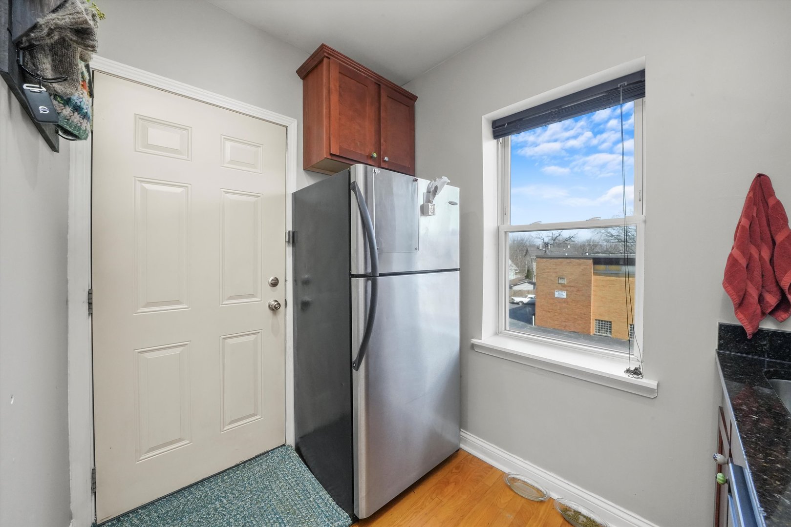 52 Forest Avenue, Unit 2S Riverside, IL 60546 - Photo 17 of 43 a white refrigerator freezer and a stove sitting inside of a kitchen
