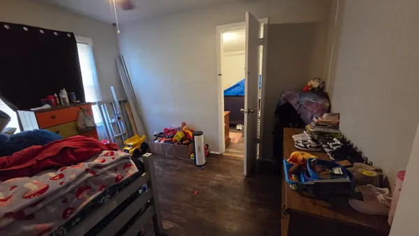 a room with furniture and a flat screen tv