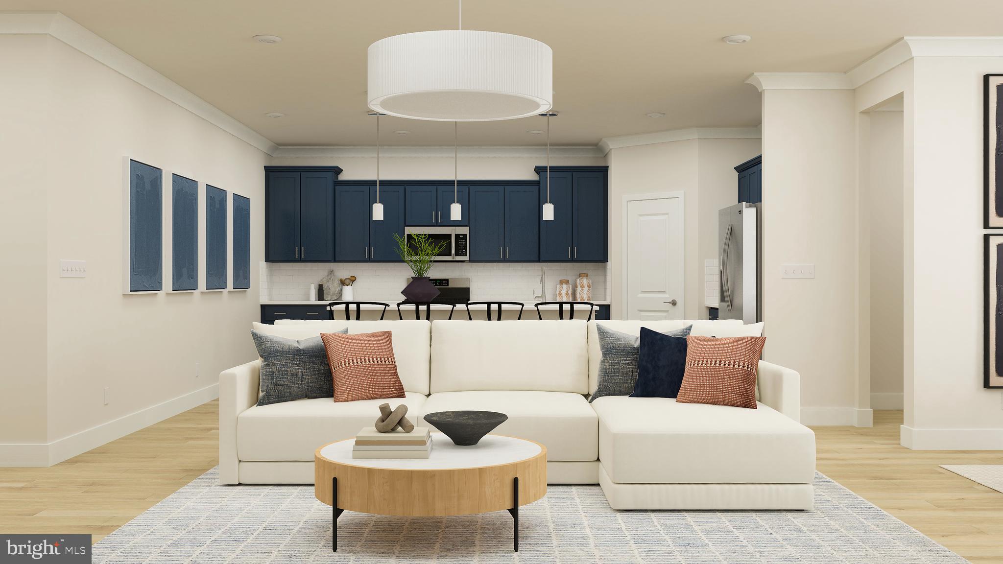 17043 Gathering Street Boyds, MD 20841 - Photo 2 of 29 a living room with furniture and a wooden floor