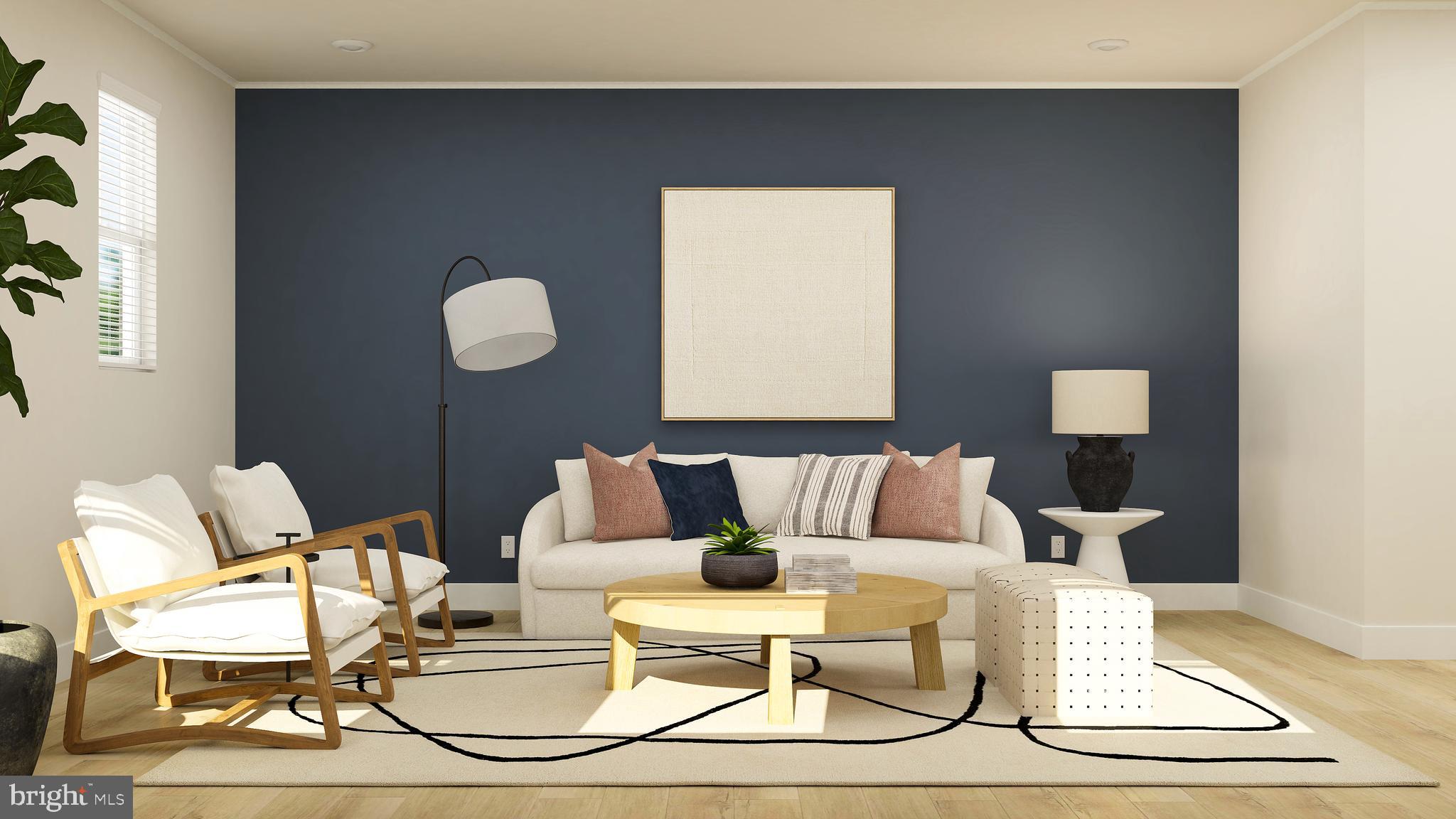 17043 Gathering Street Boyds, MD 20841 - Photo 5 of 29 a living room with furniture and a wooden floor