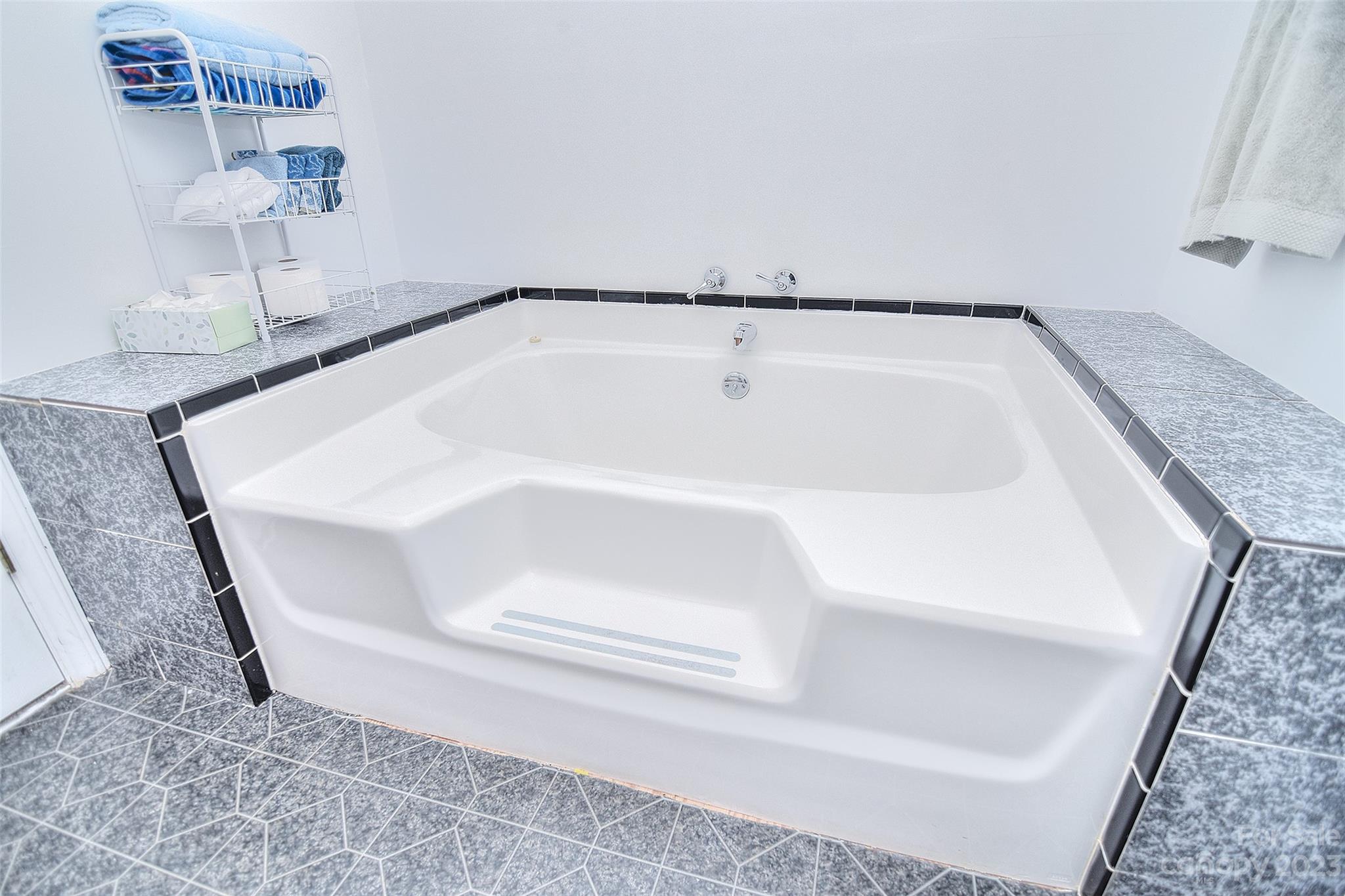 8705 Simpson Road Waxhaw, NC 28173 - Photo 26 of 46 a bathroom with a bathtub