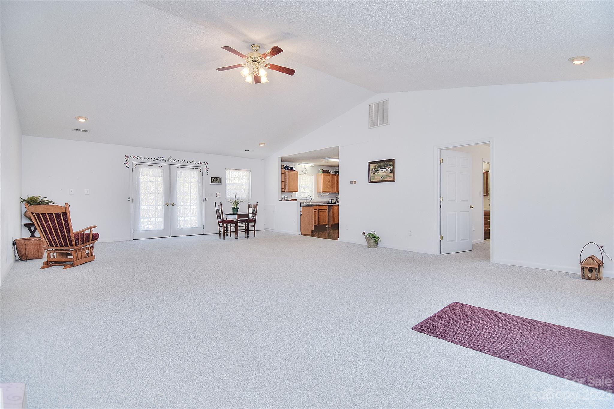 8705 Simpson Road Waxhaw, NC 28173 - Photo 5 of 46 a view of livingroom with furniture and ceiling fan