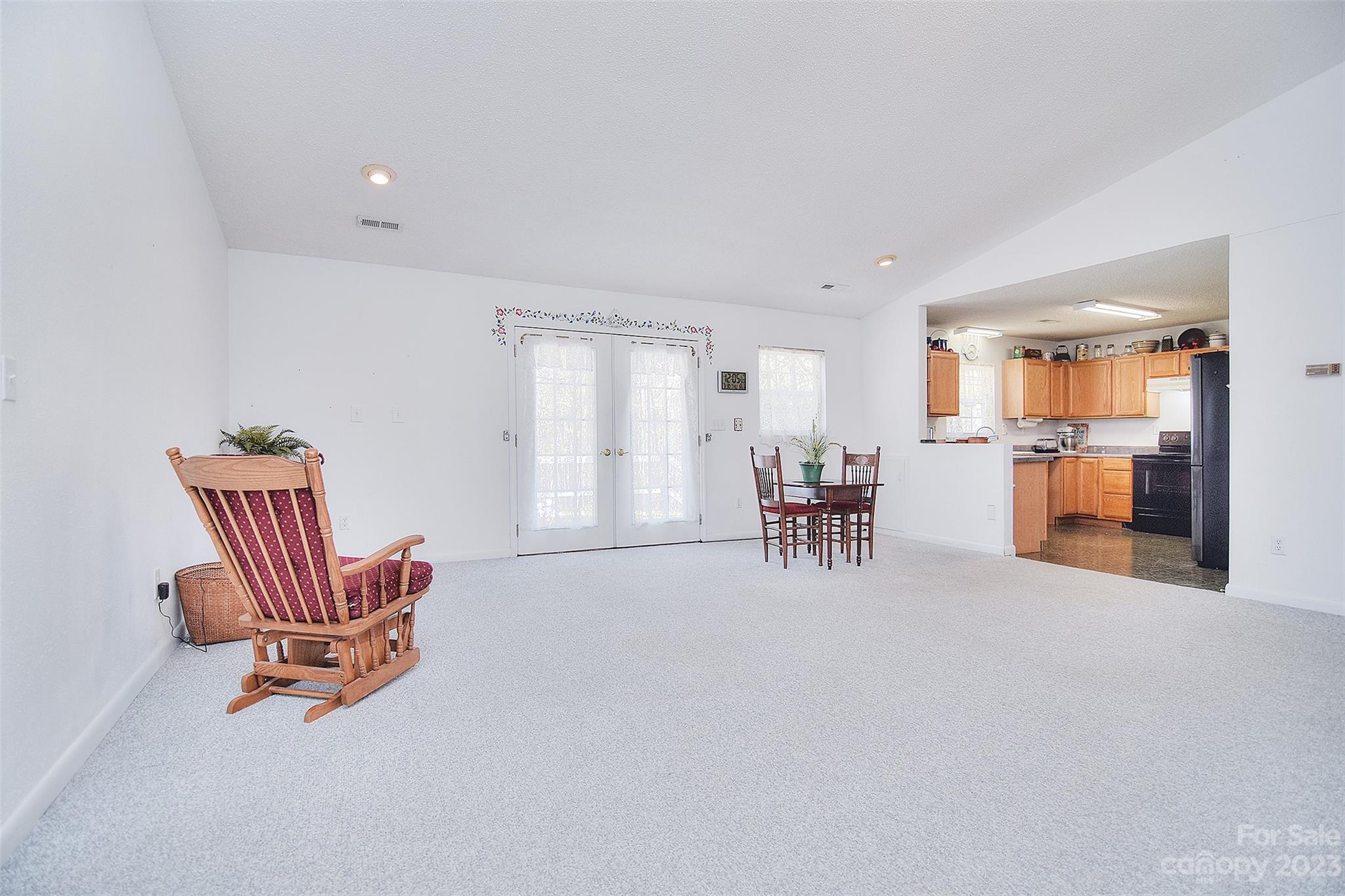 8705 Simpson Road Waxhaw, NC 28173 - Photo 9 of 46 a living room with furniture and a table