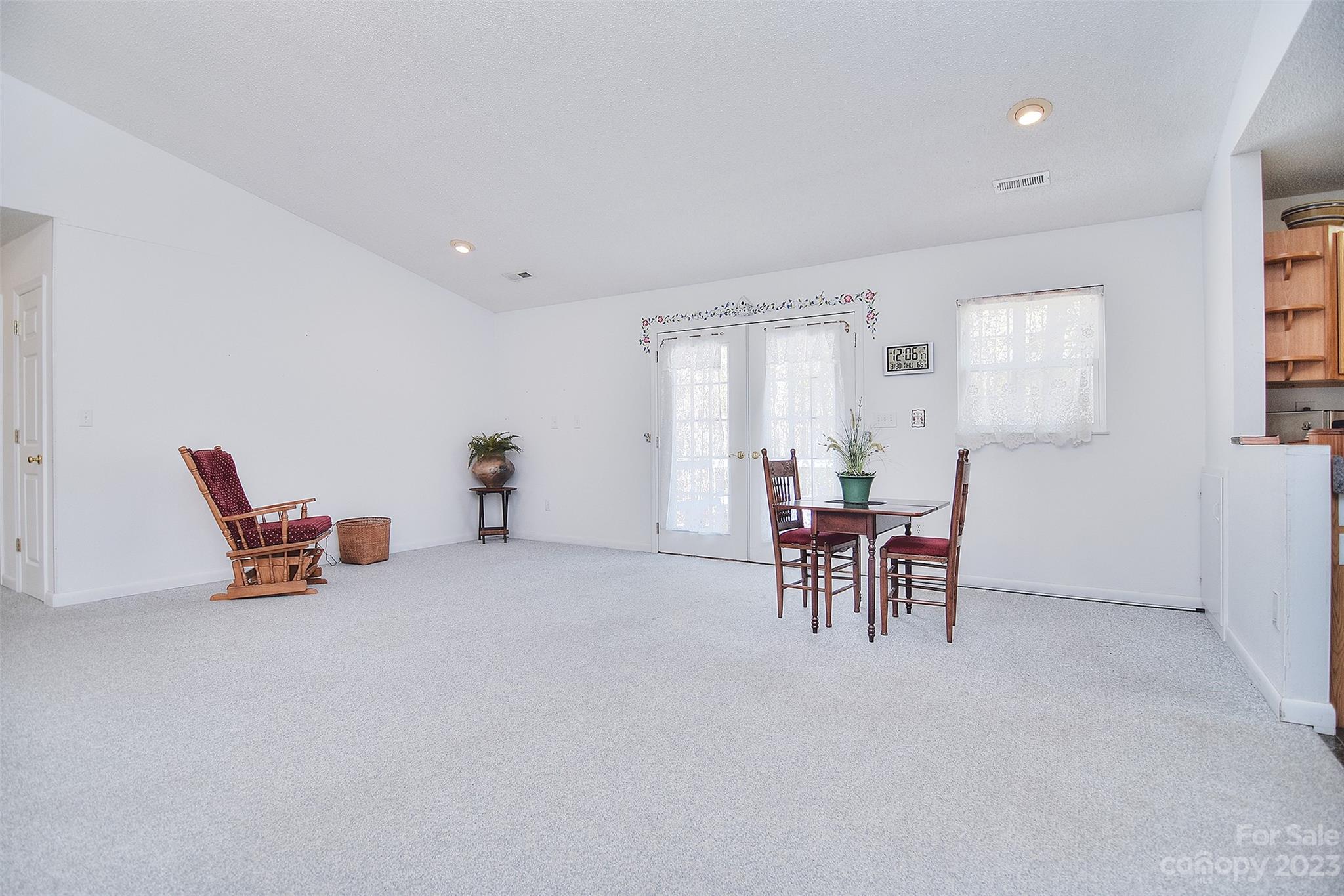 8705 Simpson Road Waxhaw, NC 28173 - Photo 10 of 46 a living room with furniture and a table
