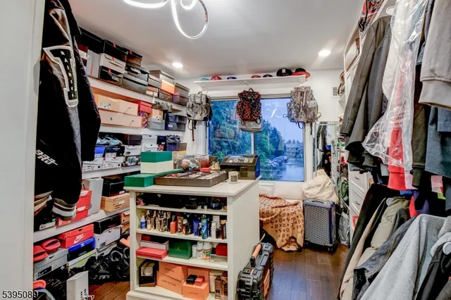 a room with furniture and a flat screen tv