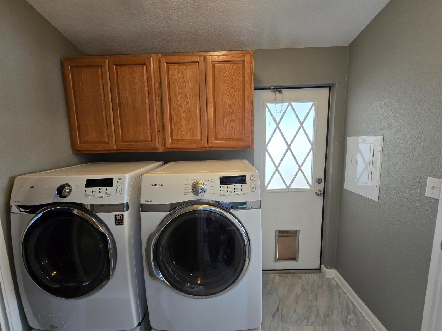 13955 West Walnut Grove Road, Unit 26 Walnut Grove, CA 95690 - Photo 14 of 31 a view of a storage & utility room with washer and dryer