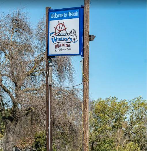 13955 West Walnut Grove Road, Unit 26 Walnut Grove, CA 95690 - Photo 27 of 31 a sign broad on the side of a wall