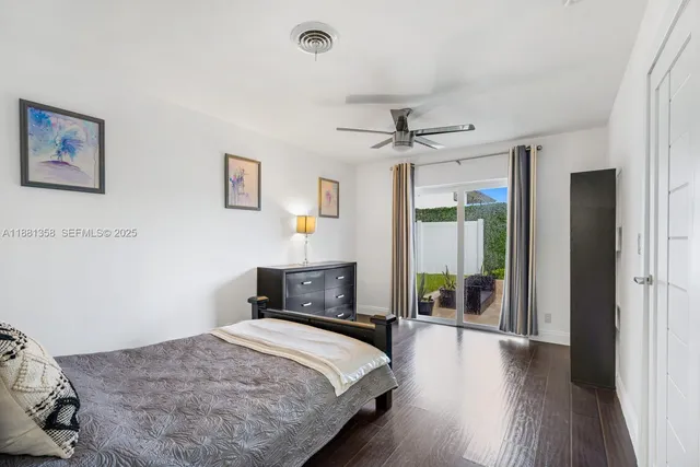 a bathroom with a sink toilet and a mirror