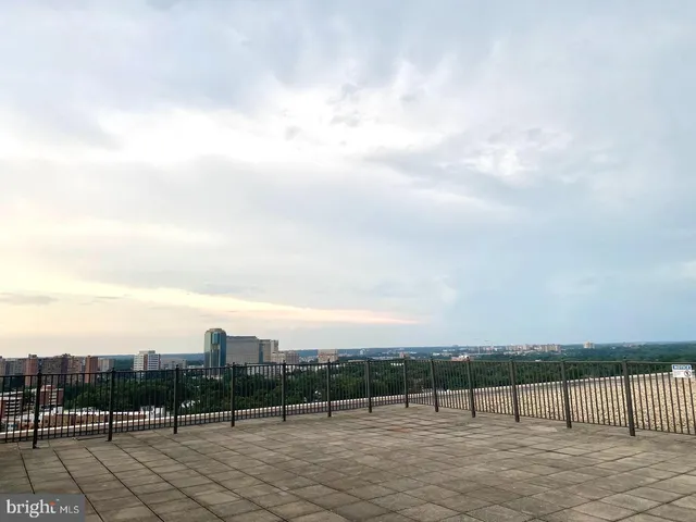 a view of swimming pool with city view