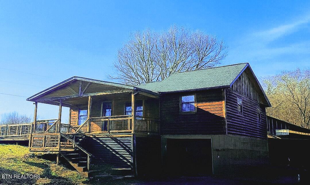 893 Brushy Valley Road Heiskell, TN 37754 - Photo 2 of 28 a front view of a house with balcony