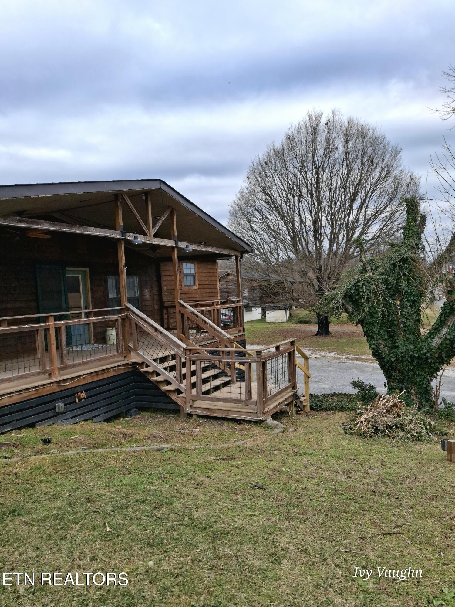 893 Brushy Valley Road Heiskell, TN 37754 - Photo 7 of 28 a front view of a house with a yard