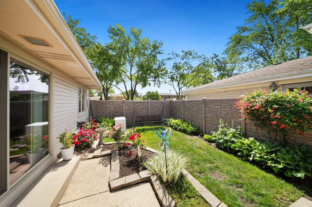 365 West Myrick Avenue Addison, IL 60101 - Photo 36 of 49 a view of a backyard with plants