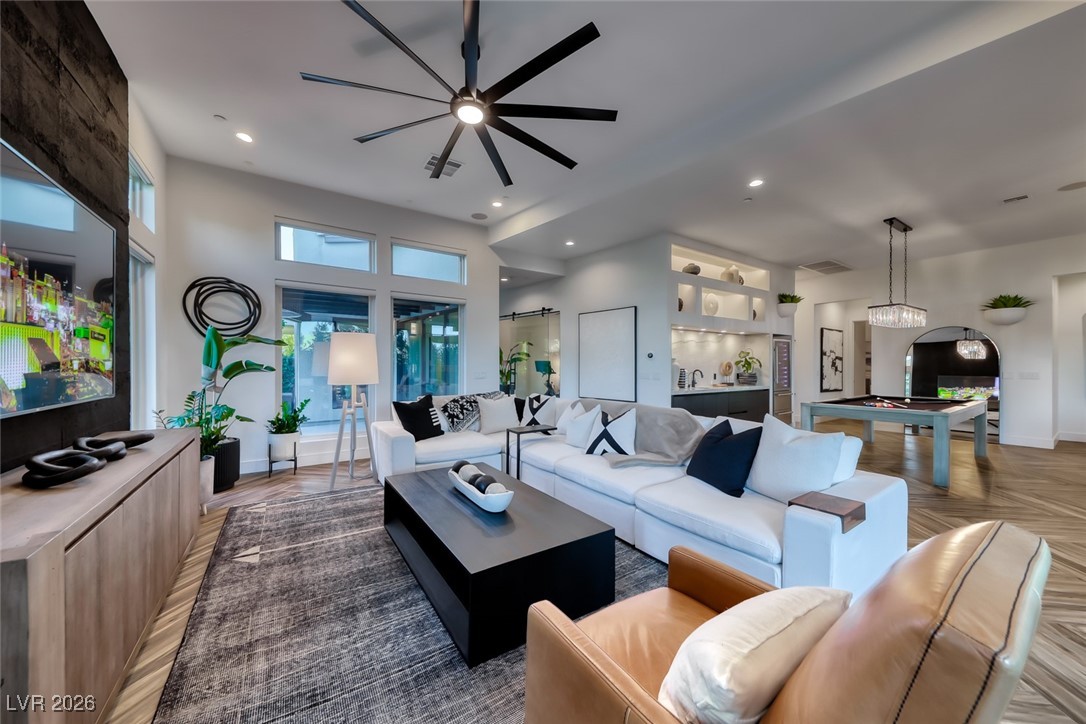 2216 Sky Pointe Ridge Drive Henderson, NV 89052 - Photo 11 of 79 Remote controlled shades make it easy to wind down at the end of the day